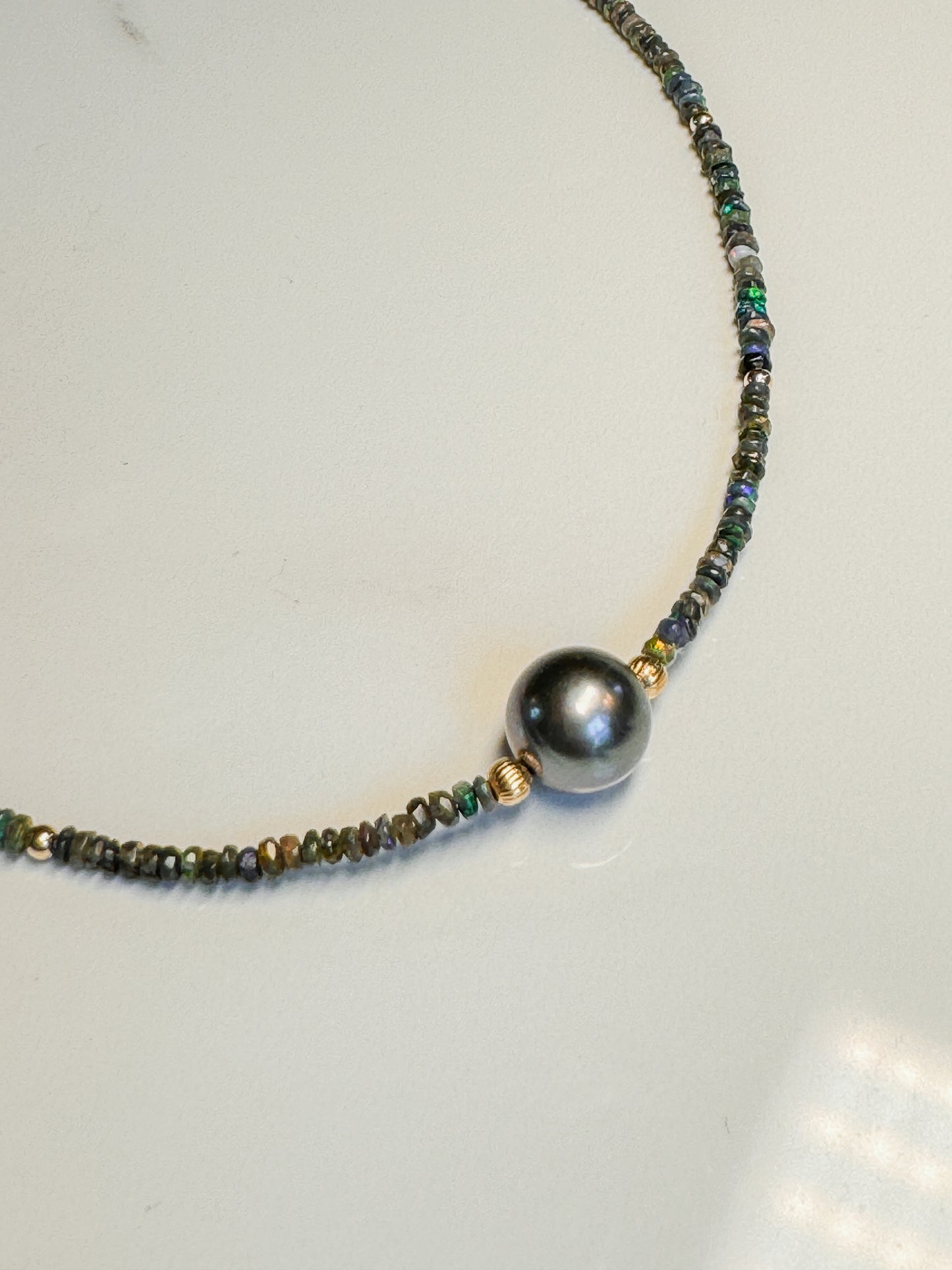 Tahitian Black Pearl with Australian black Opal in Gold