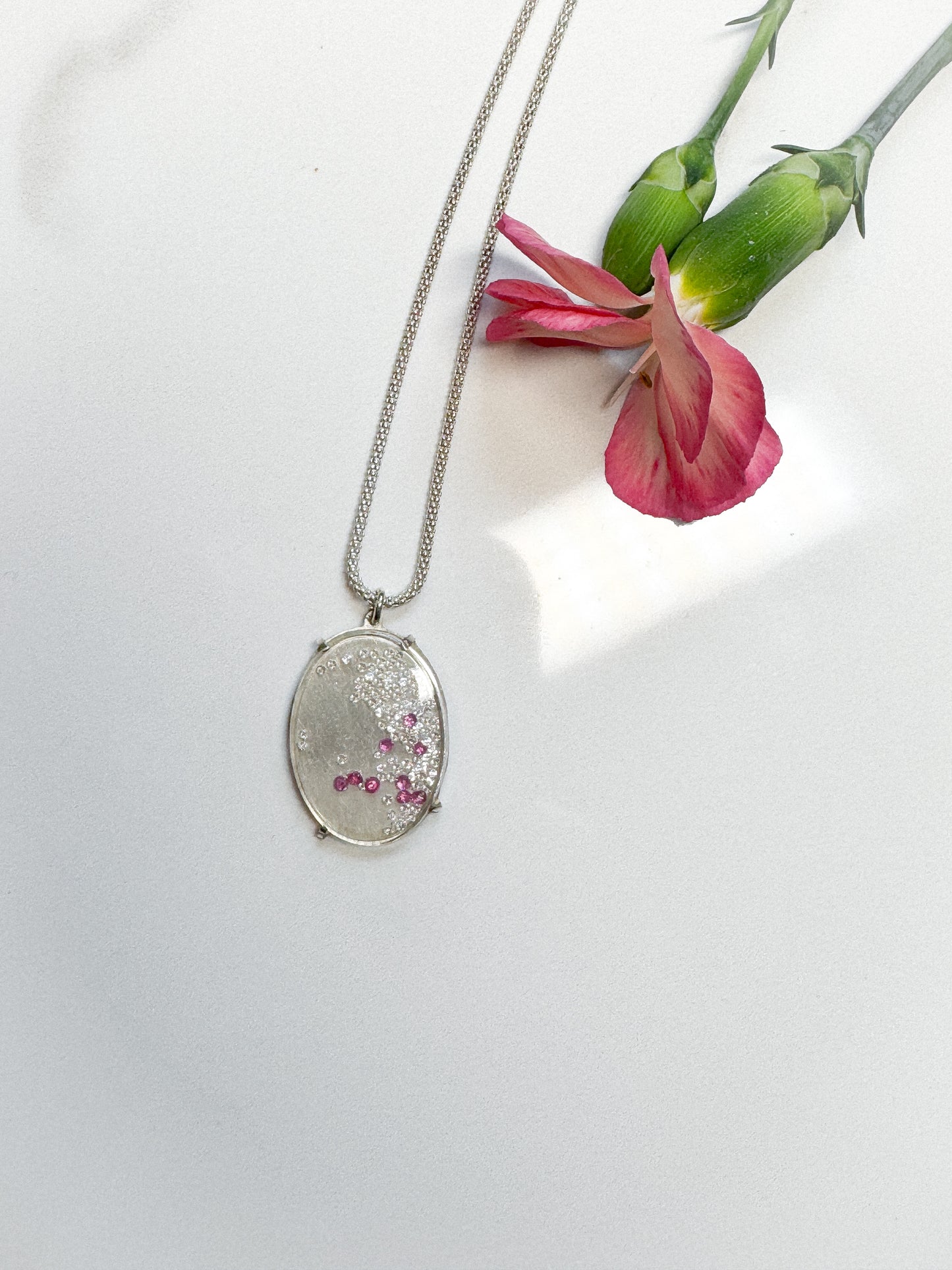 Ruby faux locket in Sterling