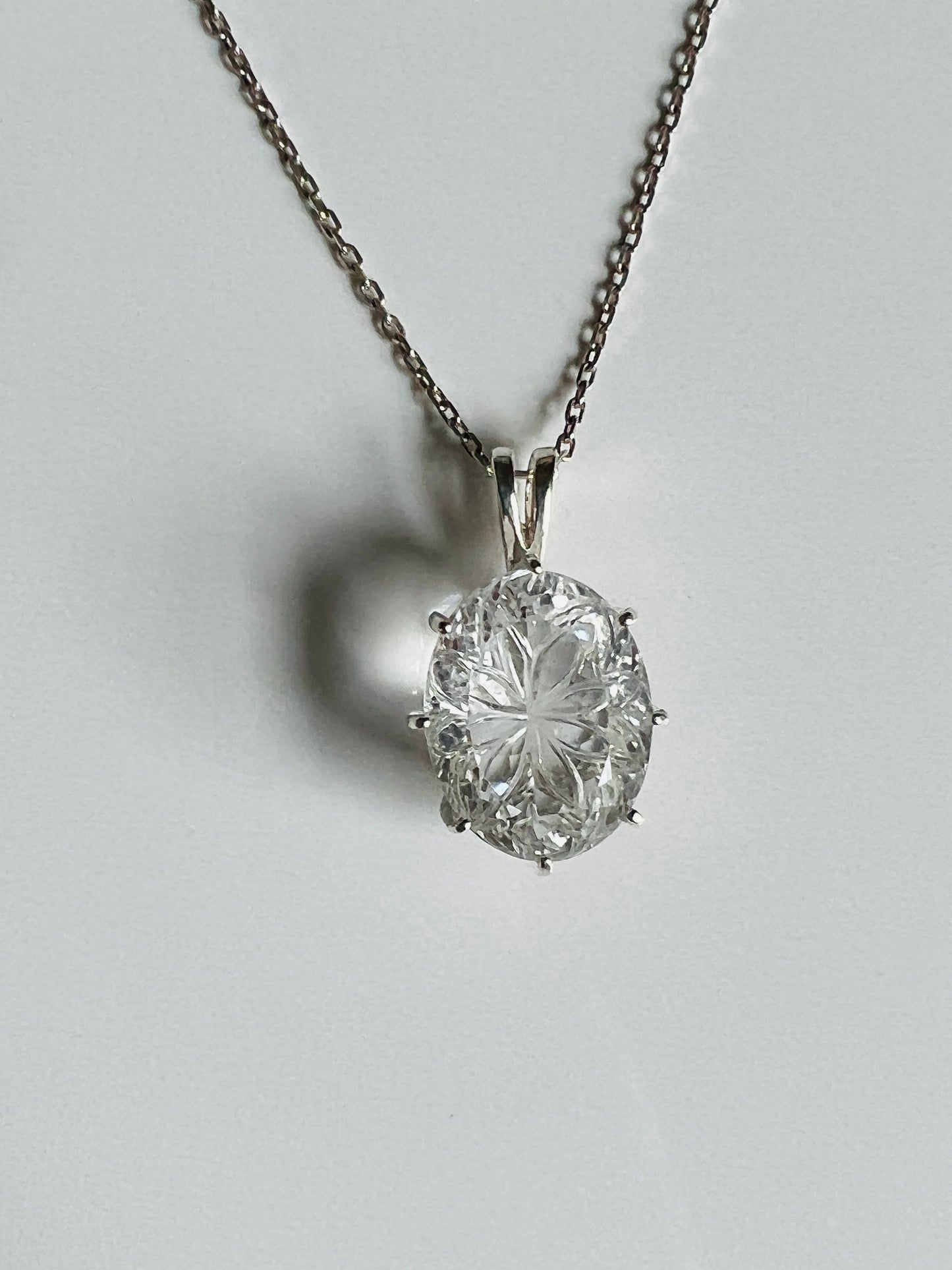 Intricately carved beautiful Clear Quartz Sterling pendant