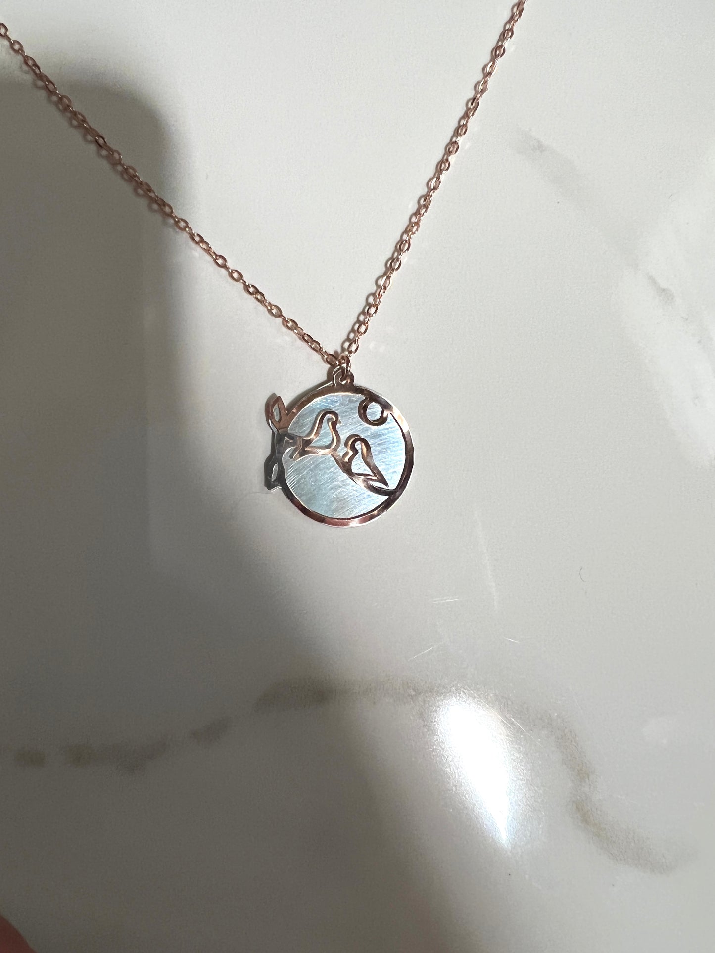 Rose gold hand cut and Sterling pendant