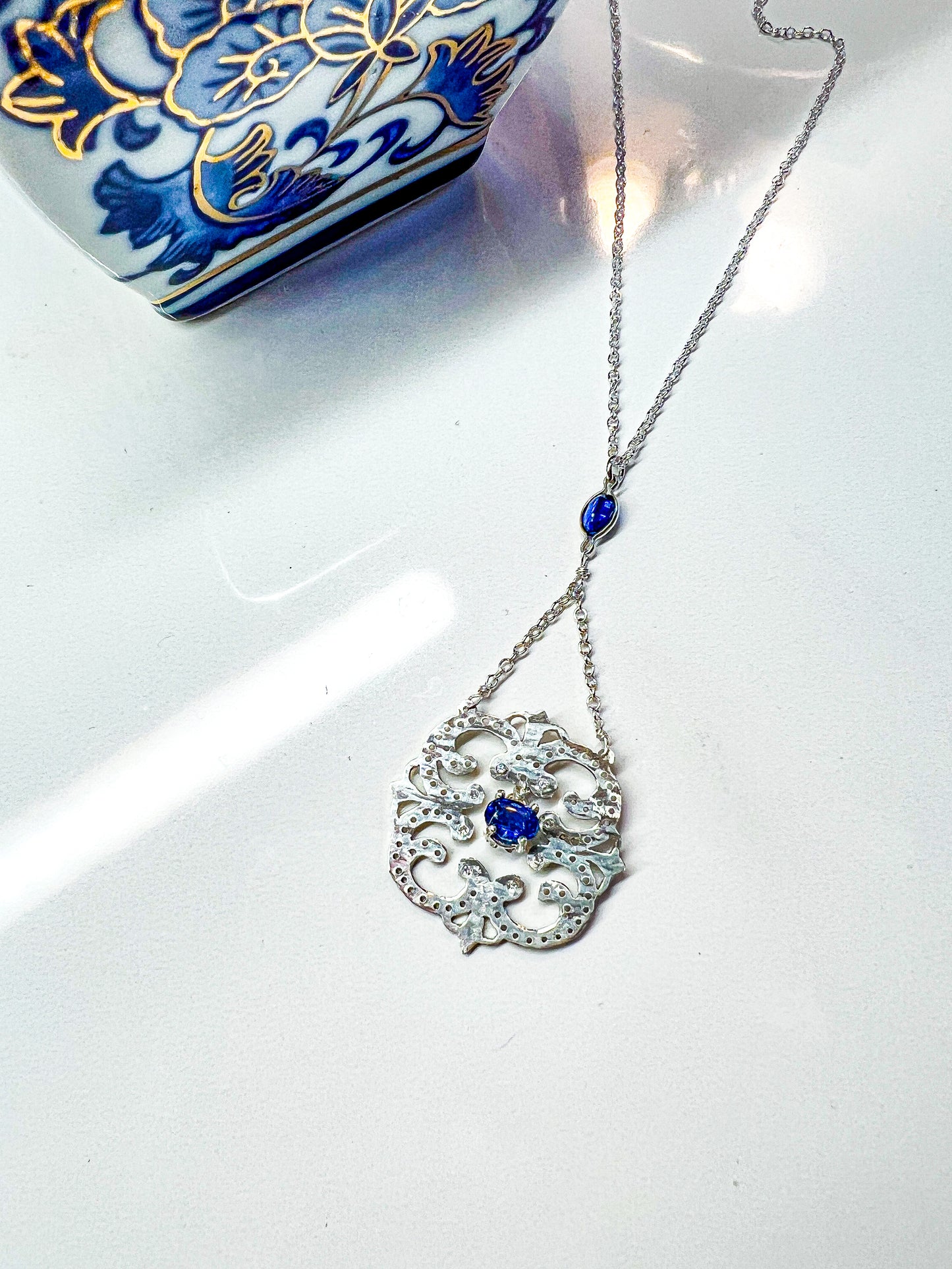 Hand-cut blue Iolite Sterling drop pendant