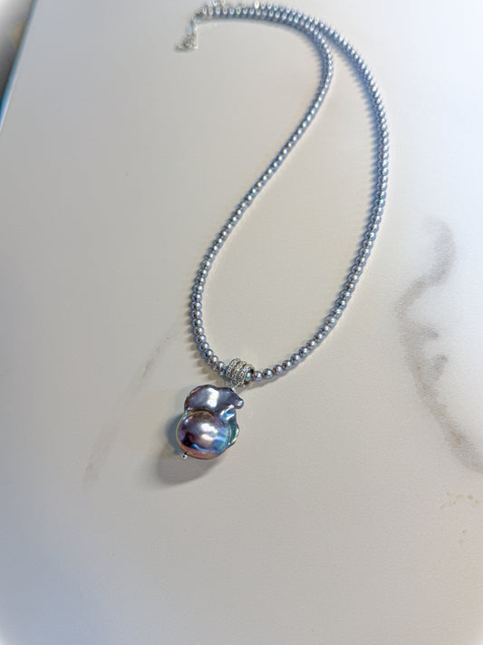 Akoya silver pearl necklace featuring blue pink silver baroque pearl dangle