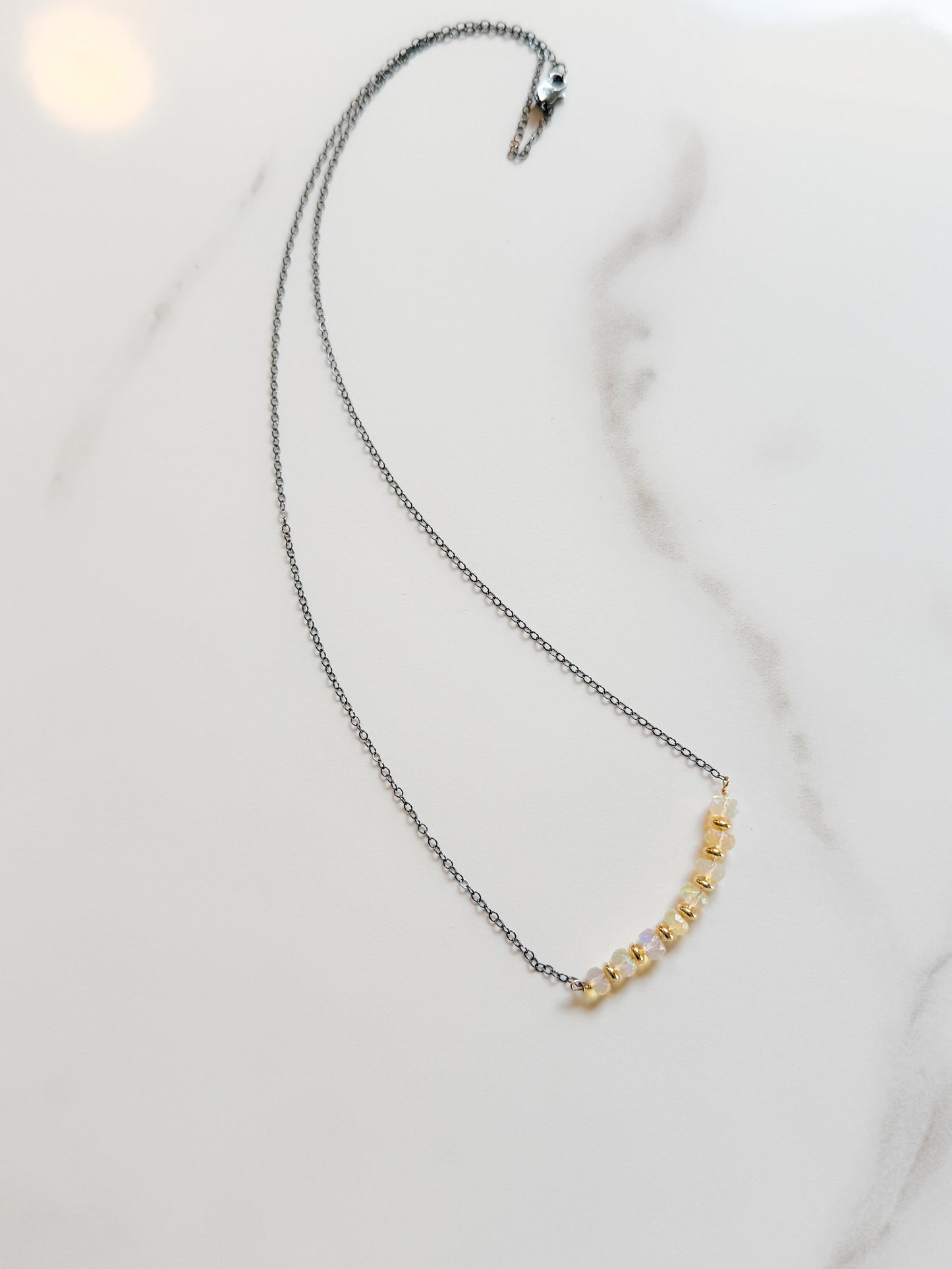 Opal and Gold fill on oxidized Sterling necklace