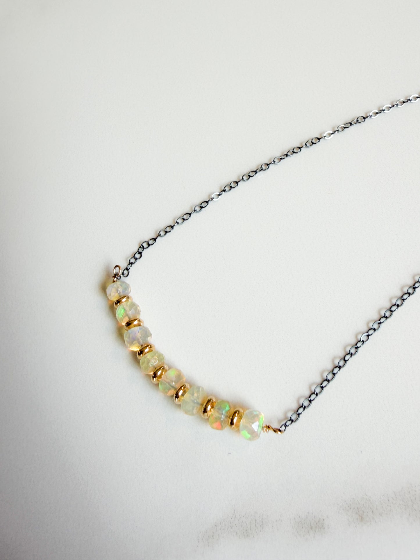 Opal and Gold fill on oxidized Sterling necklace