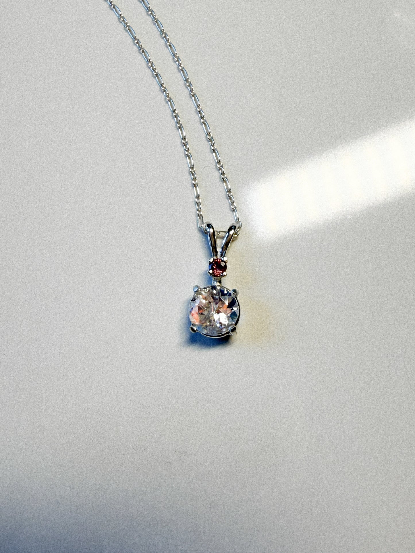 Rainbow faceted Moonstone with Pink Sapphire pendant