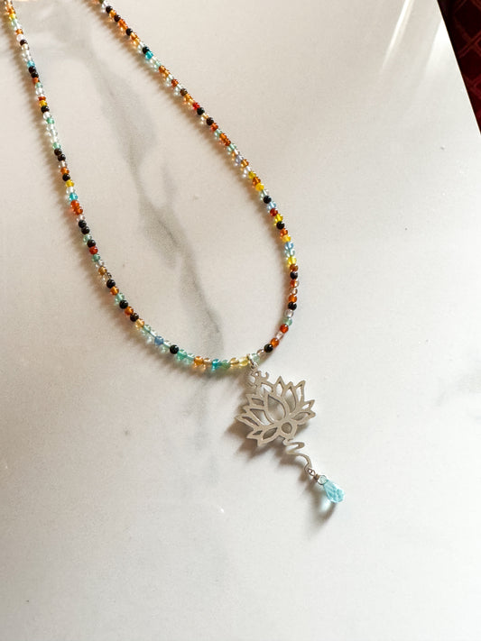 Hand-cut lotus on multi-gemstone necklace