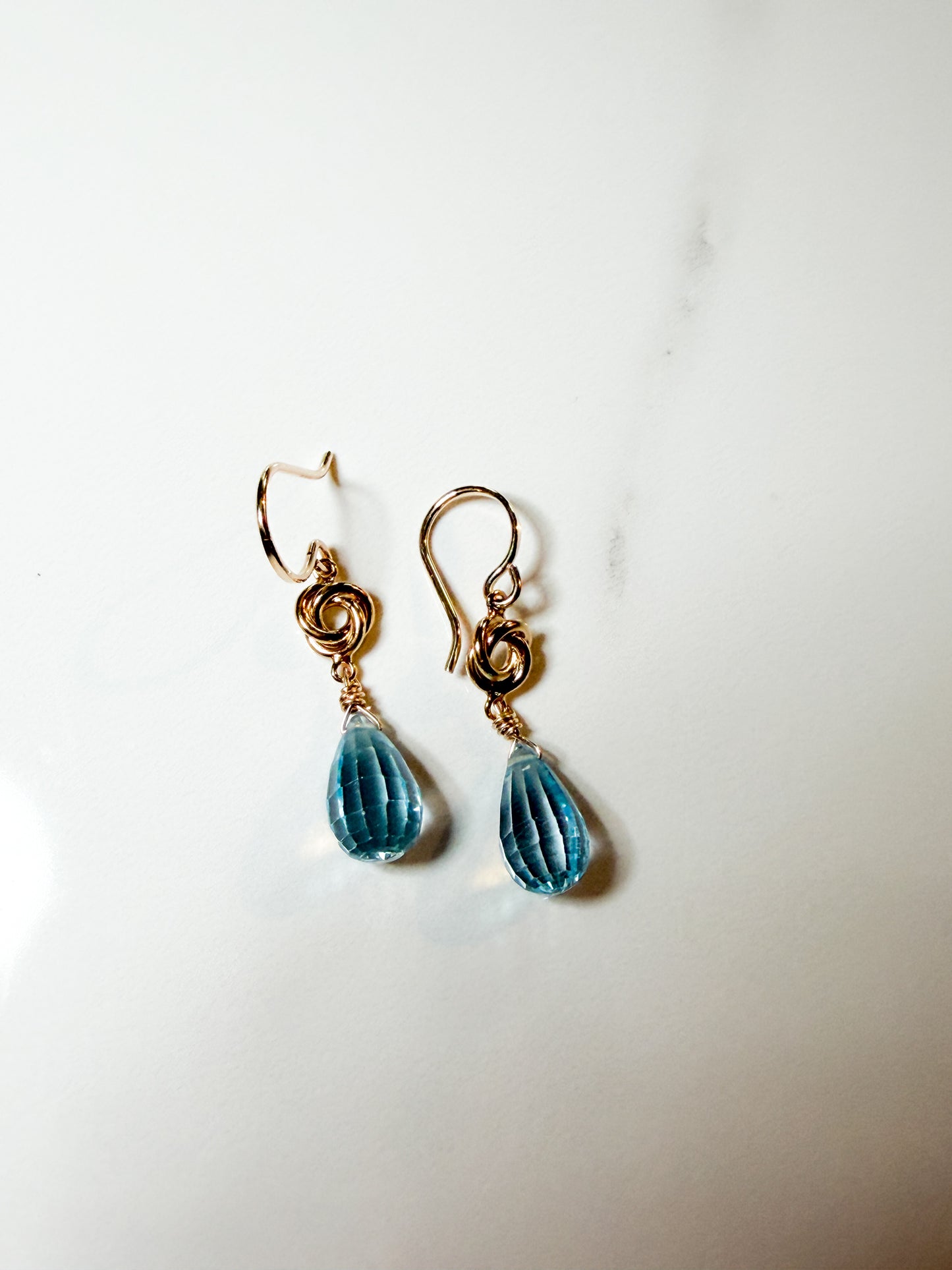 Gold filled petite knot sky blue Topaz earrings