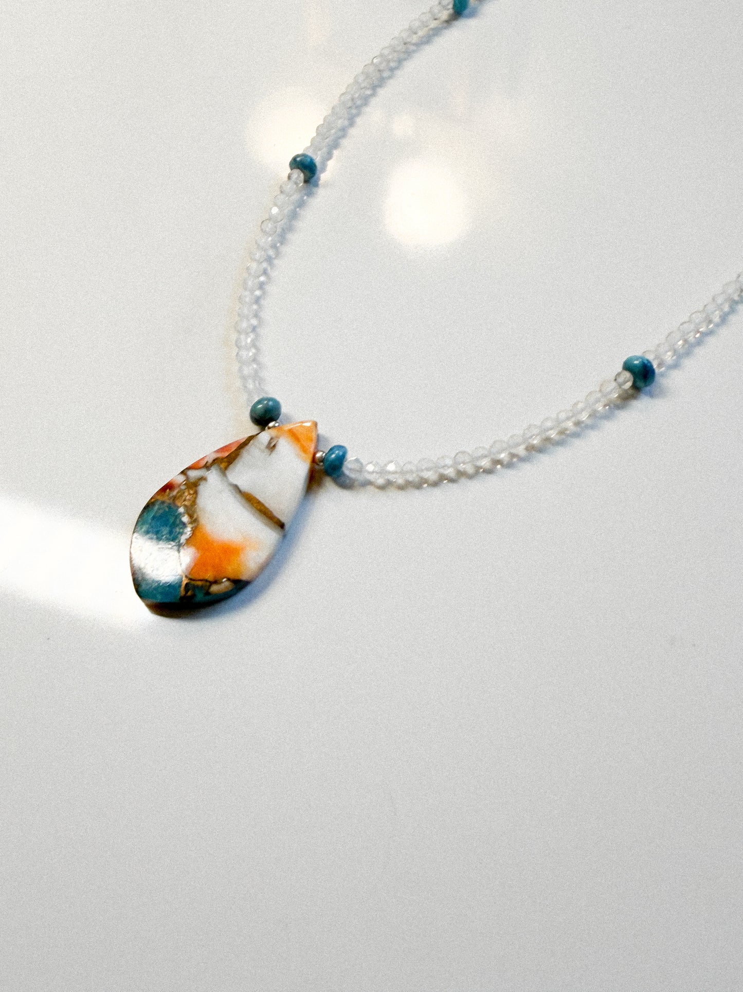Clear Crystal Quartz, Turquoise, and copper Spinny pendant