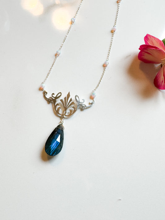 Blue flash labradorite with hand-cut Sterling design