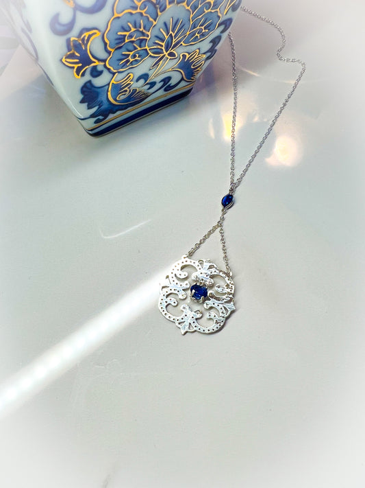 Hand-cut blue Iolite Sterling drop pendant