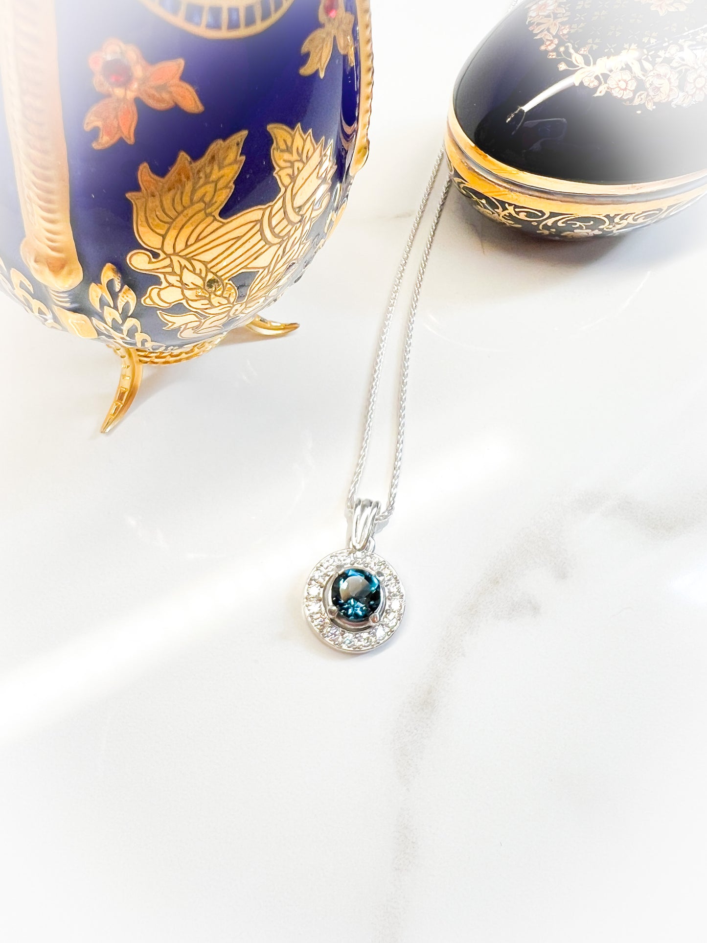 Moissanite & London blue Topaz Sterling halo pendant