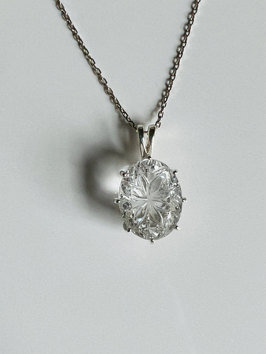 Intricately carved beautiful Clear Quartz Sterling pendant