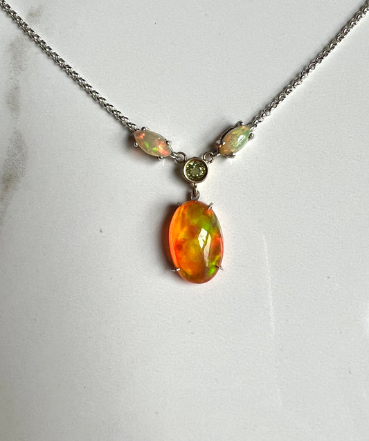 Fiery Ethiopian Opal trio with peridot accent pendant